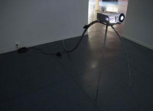 Looker, welded and sanded steel, projector, extension cord, 210 x 120 x 60cm, 2020